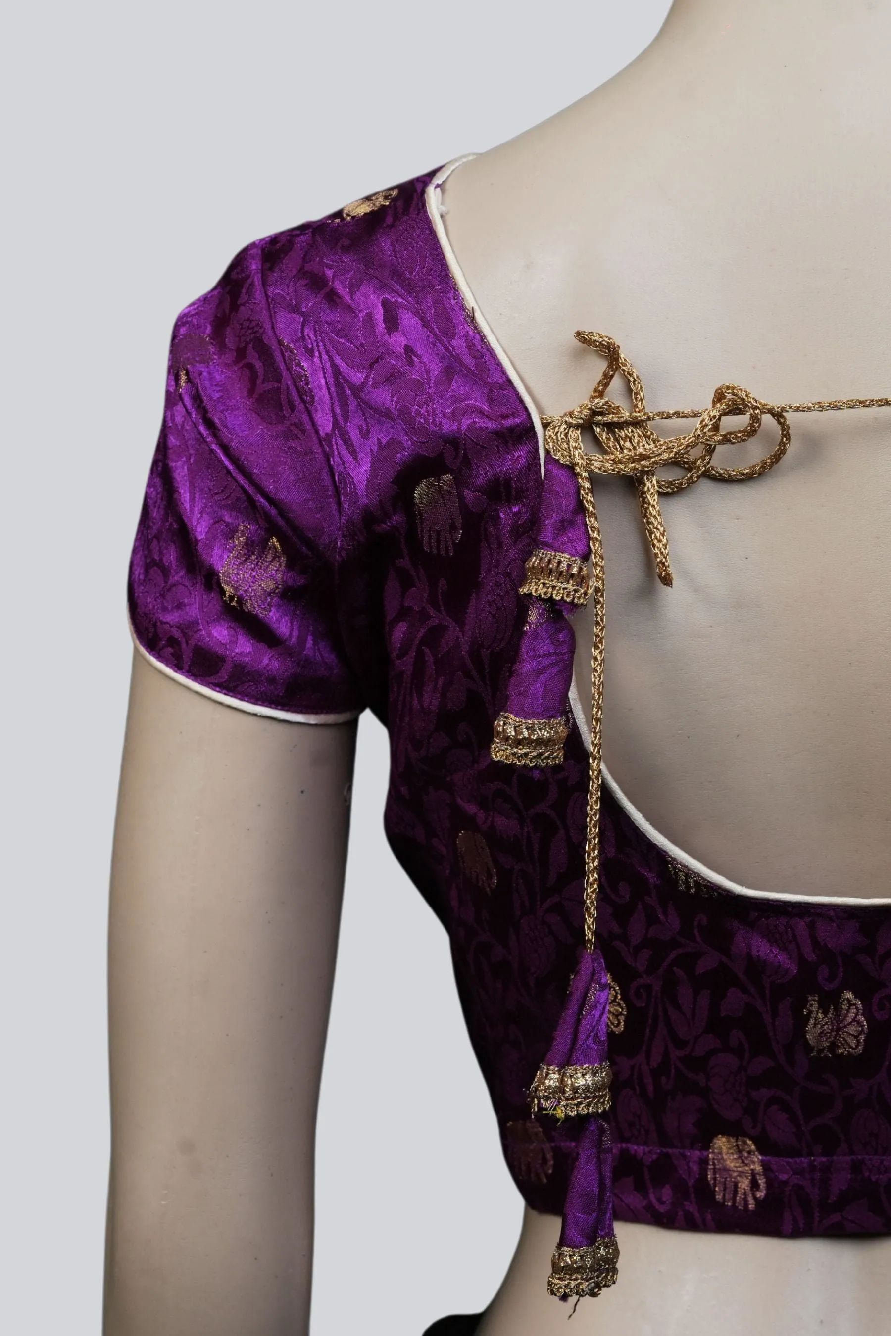 Purple Elegance: Brocade Blouse with Enchanting Elephant Motifs