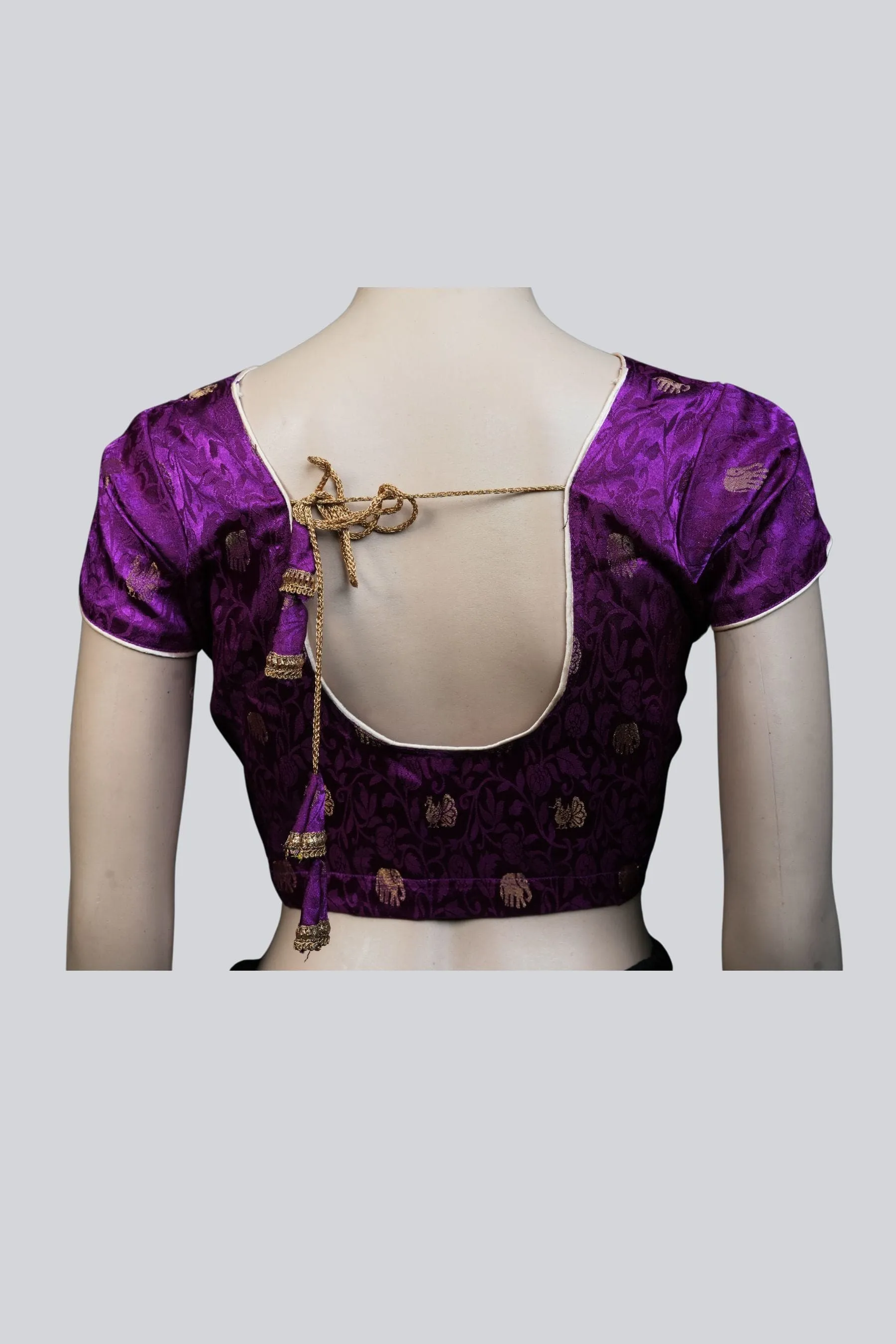 Purple Elegance: Brocade Blouse with Enchanting Elephant Motifs
